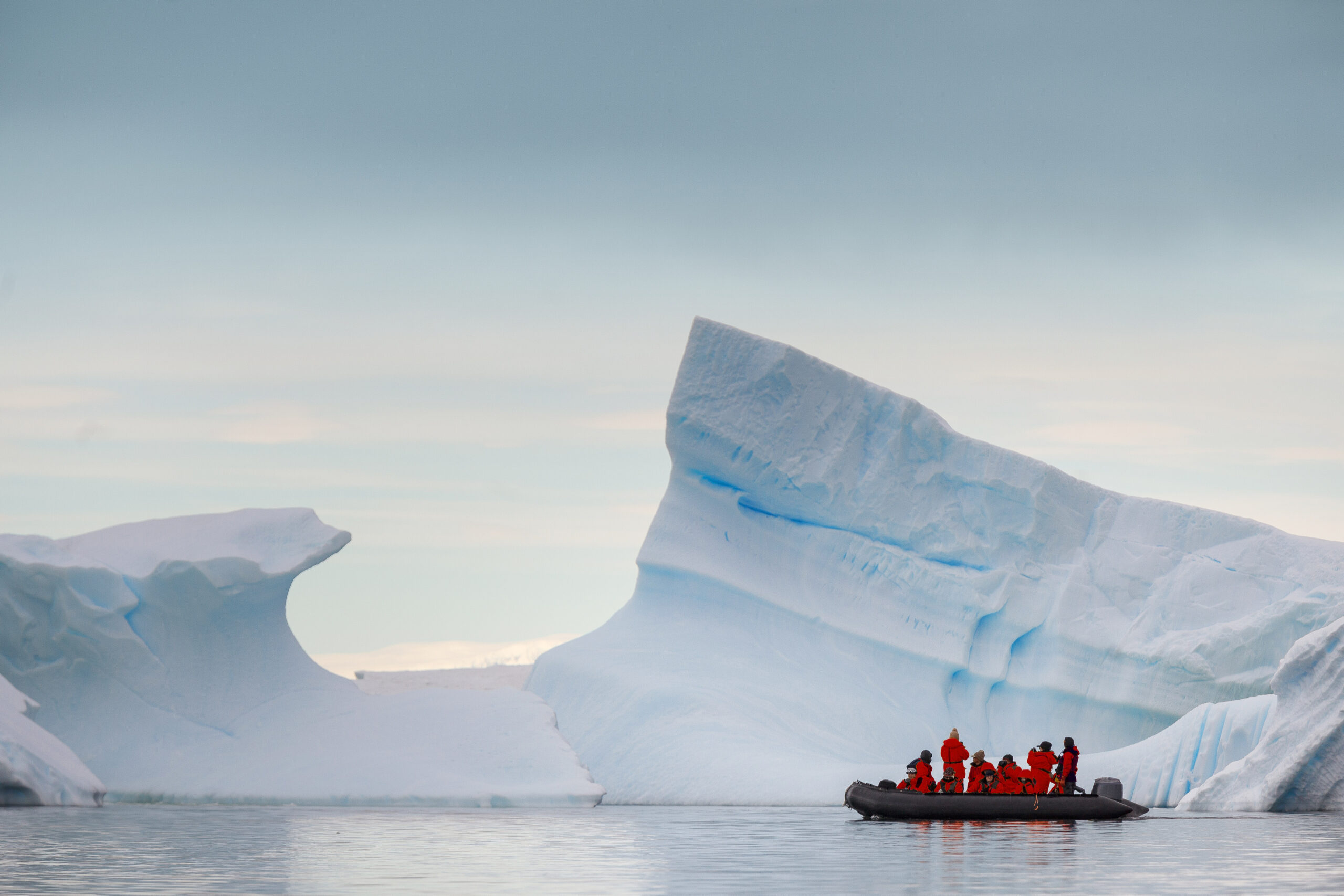 Tour group in a zodiac boat near the coast of Antarctica.